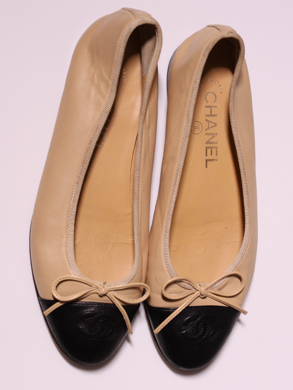 CHANEL Two-Tone Beige Leather Ballet Flats with Black Cap Toe